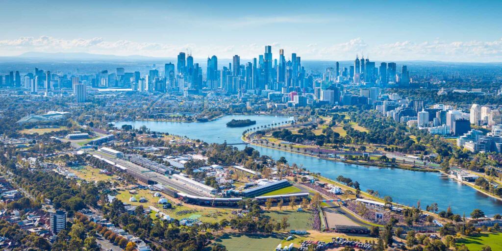 Fly Huber Helicopter flying VIP guests to Formula1 Australian Grand Prix, photos shows views over Albert Park Grand Prix Track and Melbourne CBD Skyline